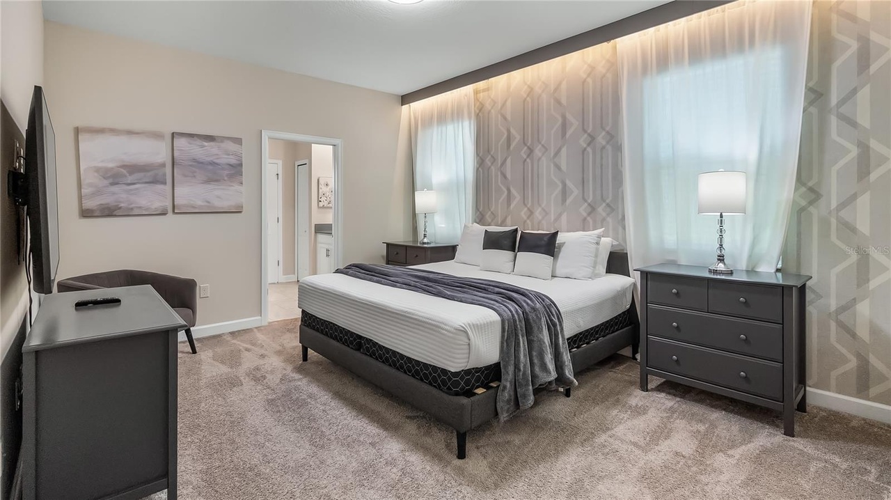 Primary bedroom inside Luxe Magic Villas