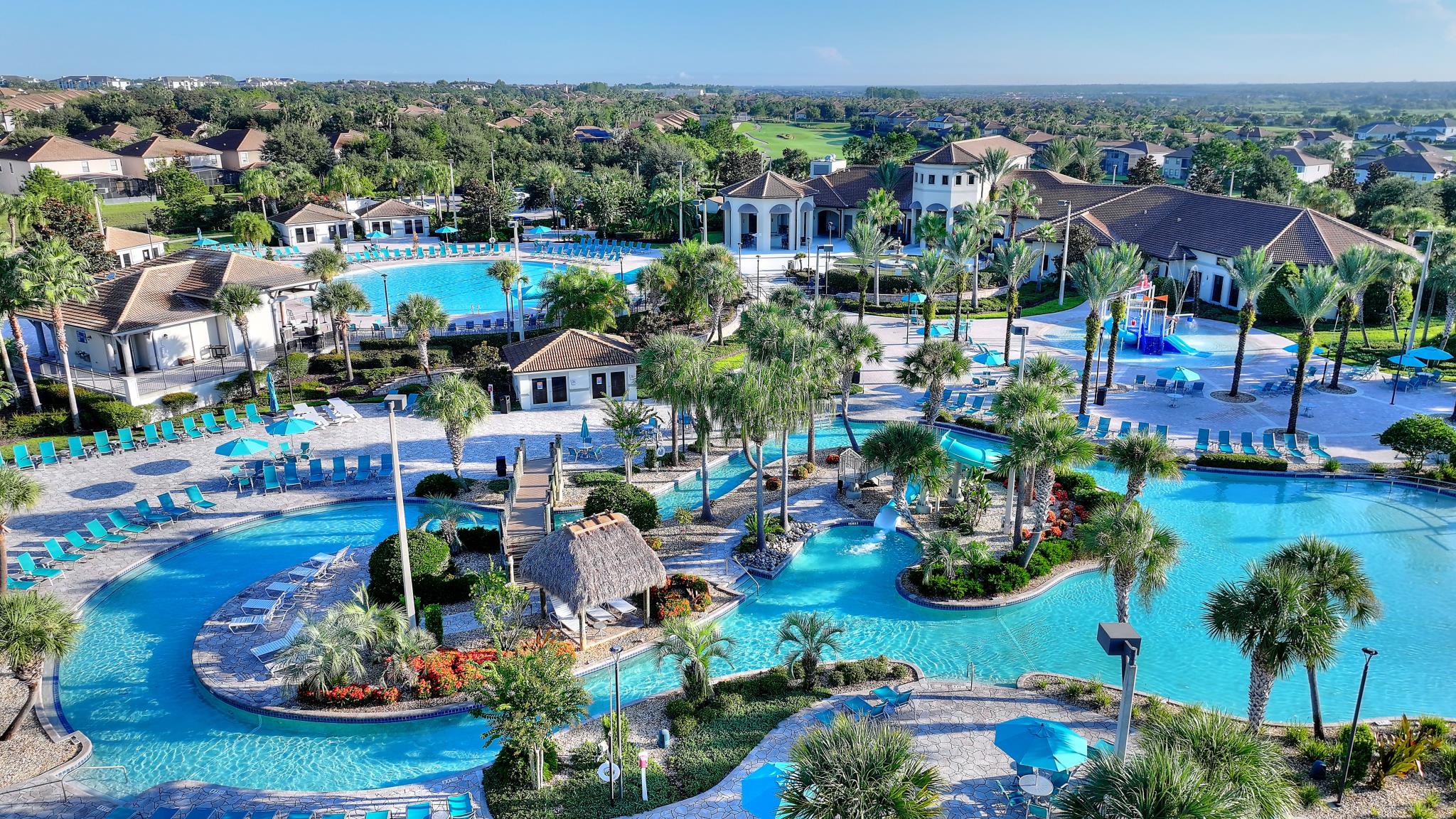 Aerial view of the Oasis Club pool complex, lazy river, and water play area